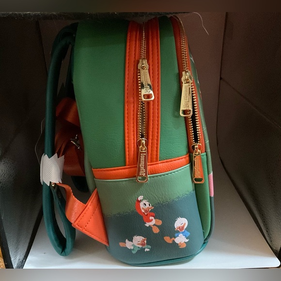 Disney: Loungefly Classic Christmas glow in the dark mini backpack green &orange - Picture 6 of 9
